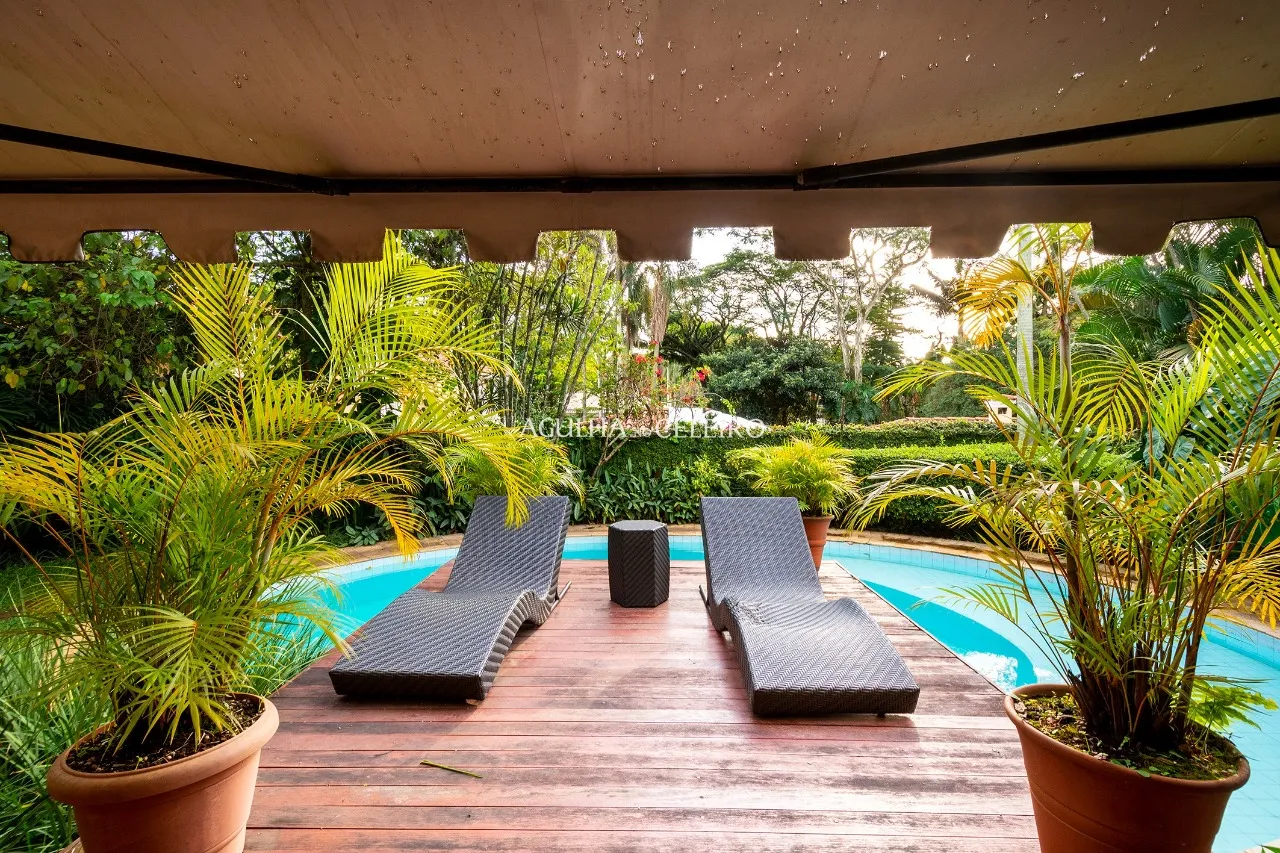 Casa com design robusto assinada por Carlos Bratke para venda ou locação no Jardim Guedala – 13371 - DSC_9561