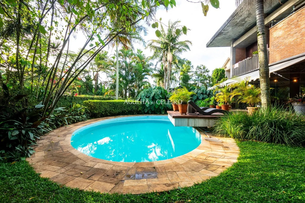 Casa com design robusto assinada por Carlos Bratke para venda ou locação no Jardim Guedala – 13371 - DSC_9568