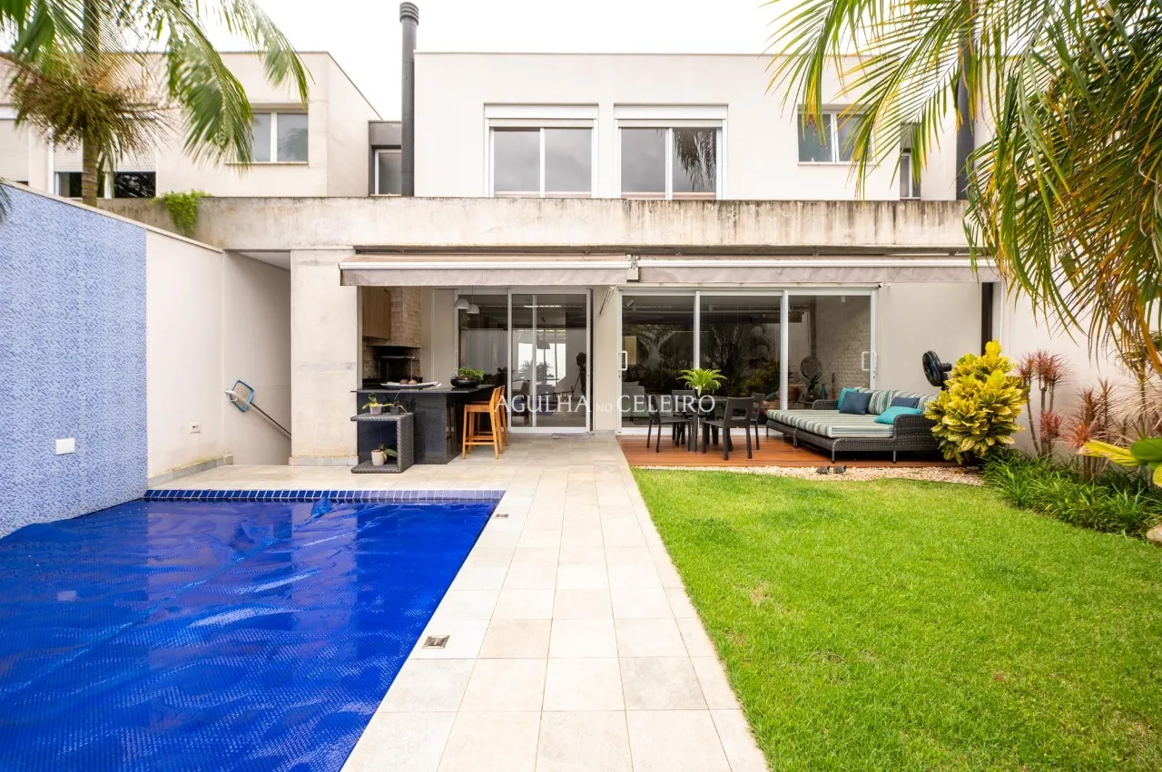 Casa com living externo e piscina à venda no Brooklin – 12523