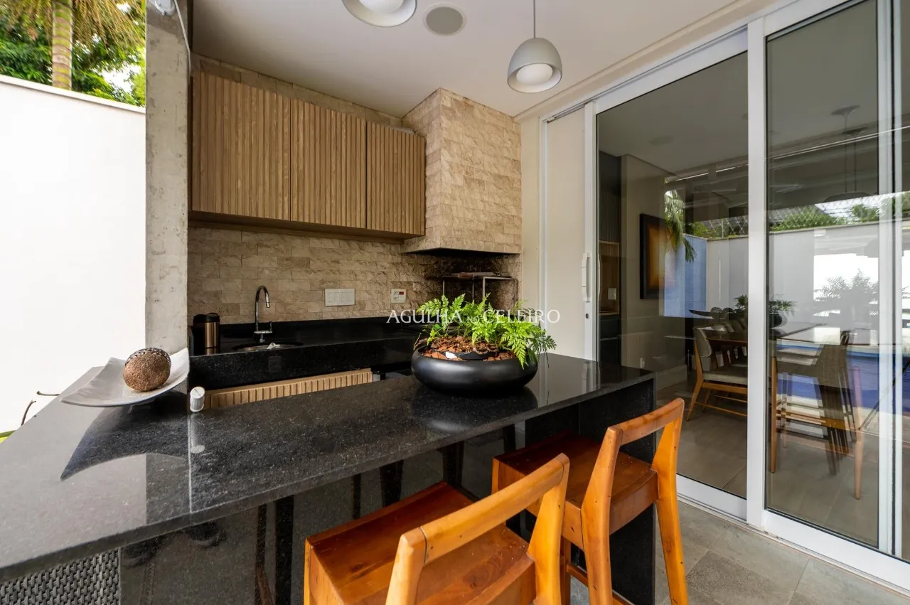 Casa com living externo e piscina à venda no Brooklin – 12523
